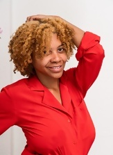 Mature black woman with red hair exposes cute hairy pussy