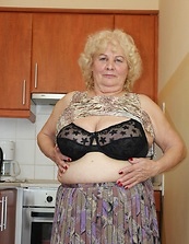 Busty Granny Teasing In Black Lingerie