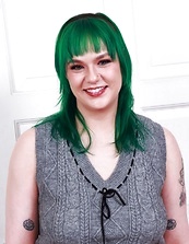 Green Haired Babe With Bushy Pussy Photos