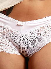 Naked asian beauty stripping lace panties to reveal bushy hairy pussy in spread pose